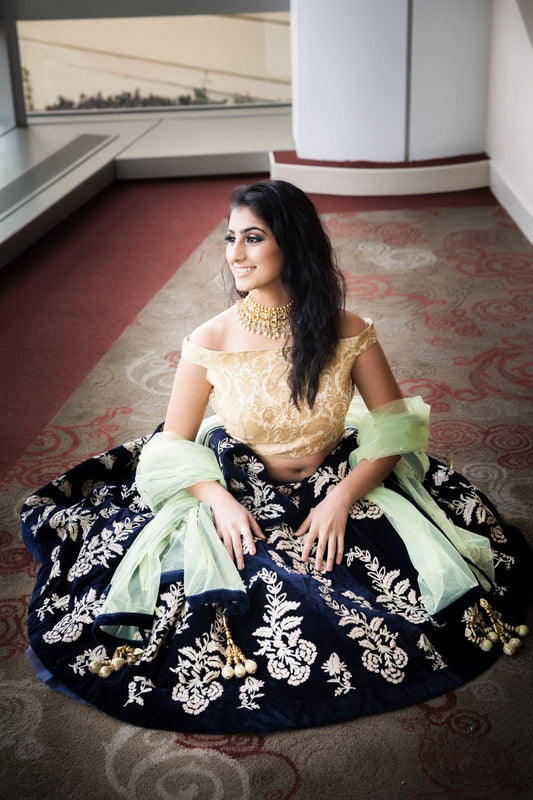 Hand embroidered deep blue lehenga with off shoulder
