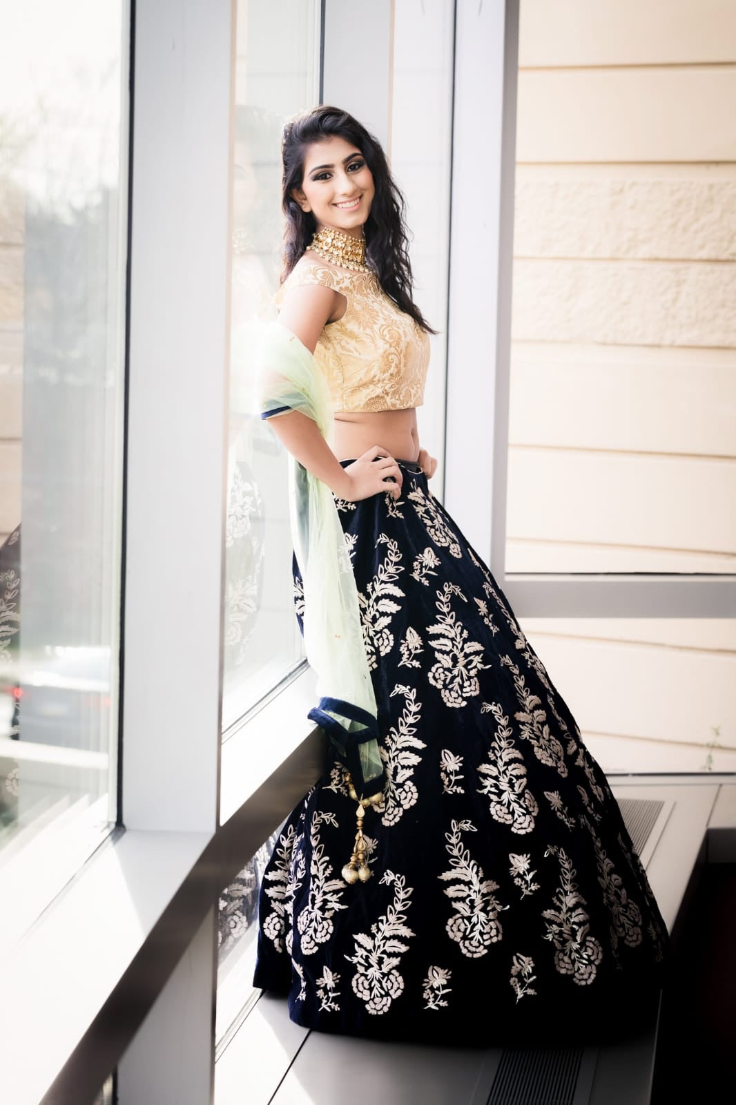 Hand embroidered deep blue lehenga with off shoulder choli